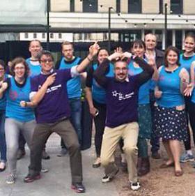 Photograph of researchers celebrating completing marathon run